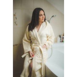 Klädsel med huva i bomull (kräm). 