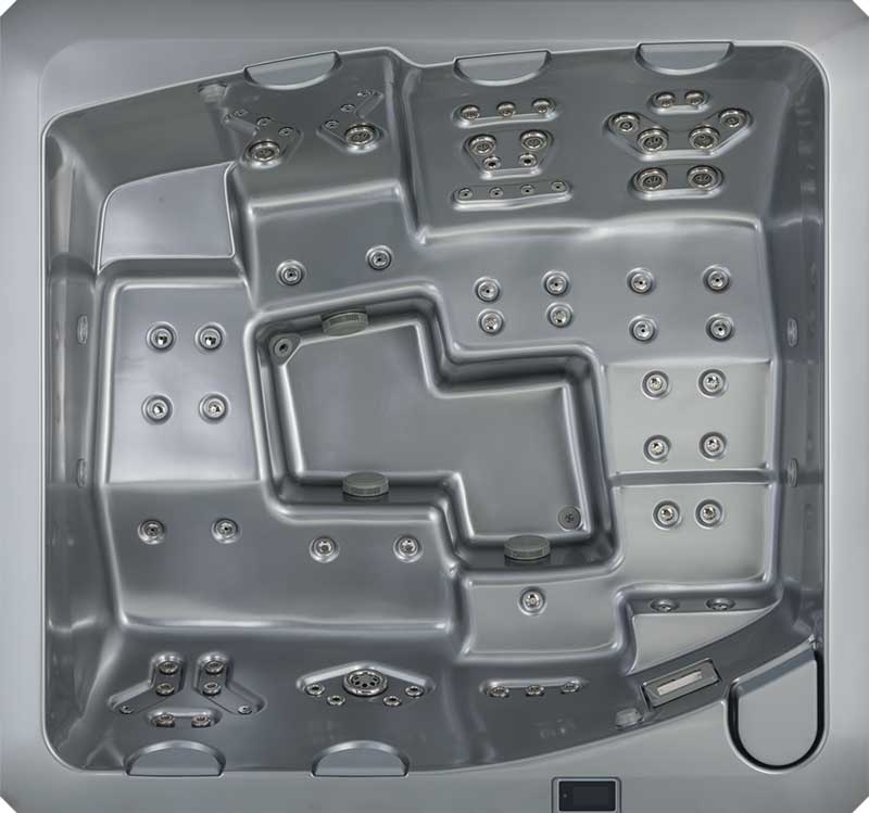 Ovanifrån av en grå USSPA-spapool med ergonomiska sittplatser och flera jetzoner